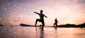 Picture of a mandala with two people doing yoga